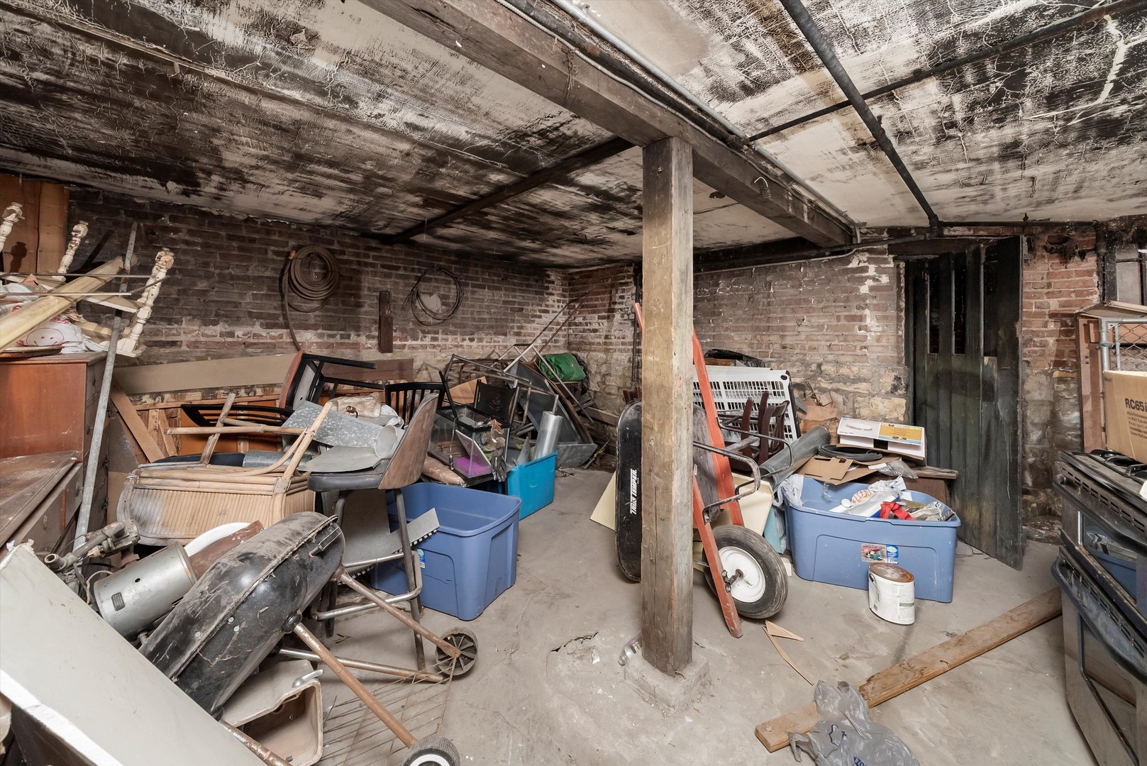 5758 South Honore Street Chicago, IL 60636 - Photo 48 of 57 a view of a storage room with a lot of stuff