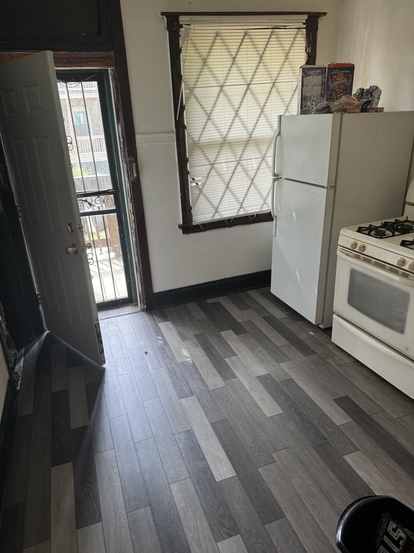 5758 South Honore Street Chicago, IL 60636 - Photo 10 of 57 a view of kitchen and utility room