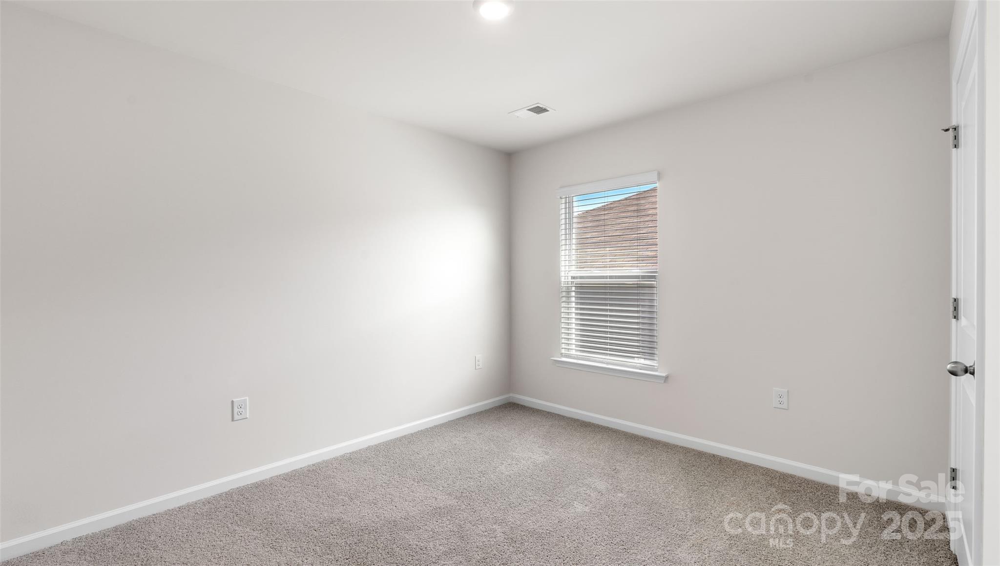 382 Wheatfield Road Fletcher, NC 28732 - Photo 13 of 24 a view of an empty room with a window