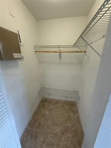 a view of a room with racks on the wall