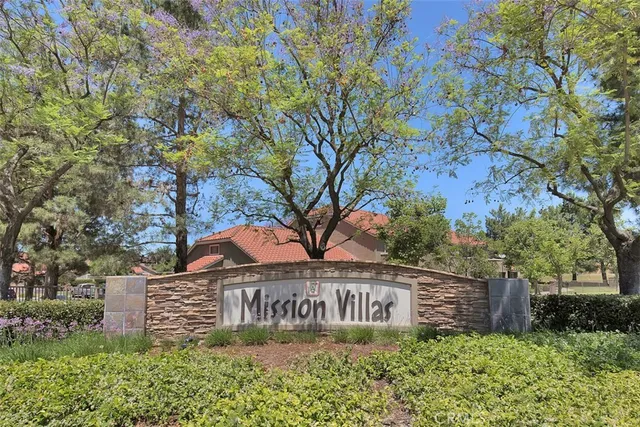 a view of outdoor space with signage and flags