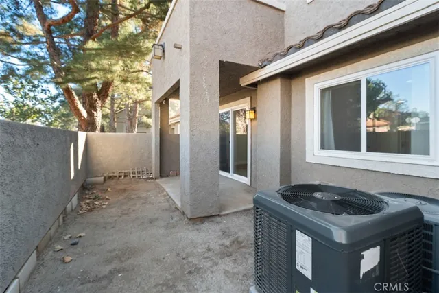 a front view of a house with parking space