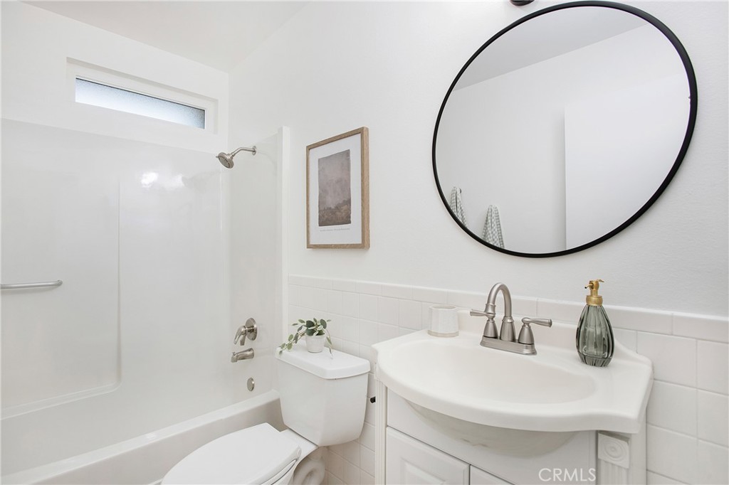316 Mountain Court Brea, CA 92821 - Photo 13 of 33 a bathroom with a sink a toilet and a mirror