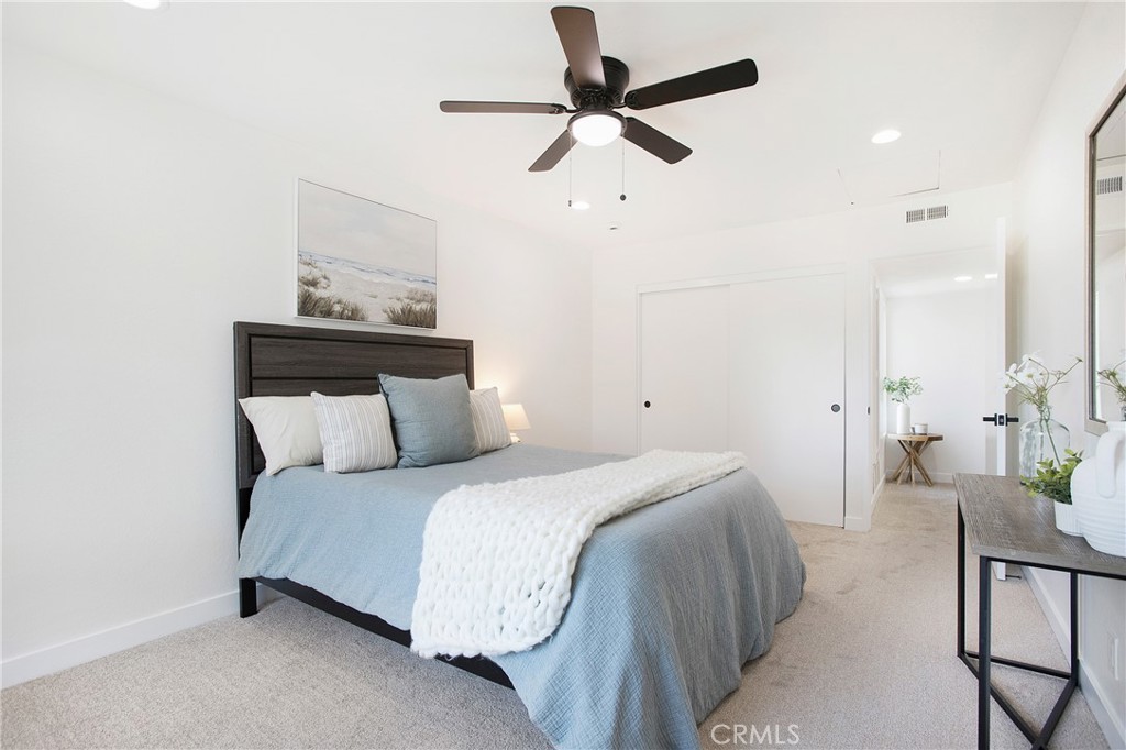 316 Mountain Court Brea, CA 92821 - Photo 16 of 33 a bedroom with a bed and a chandelier