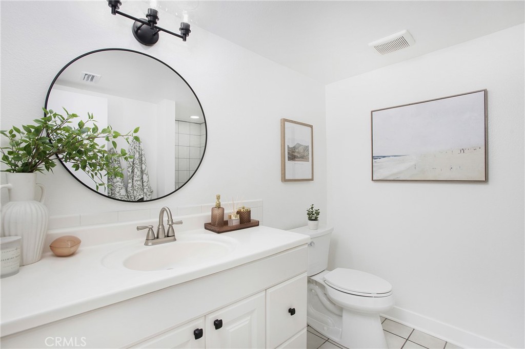 316 Mountain Court Brea, CA 92821 - Photo 17 of 33 a bathroom with a sink and a mirror