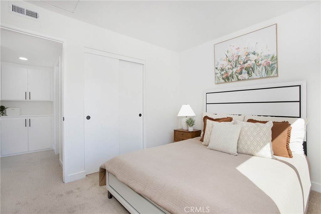 316 Mountain Court Brea, CA 92821 - Photo 19 of 33 a bedroom with a bed and a painting on the wall