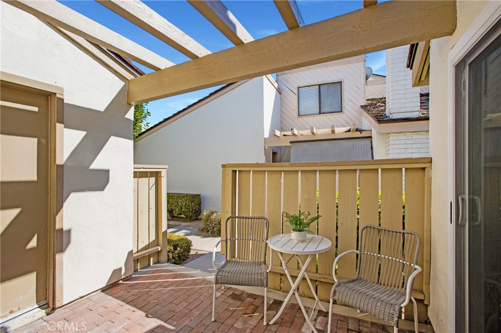 316 Mountain Court Brea, CA 92821 - Photo 22 of 33 a view of a patio with table and chairs and potted plants