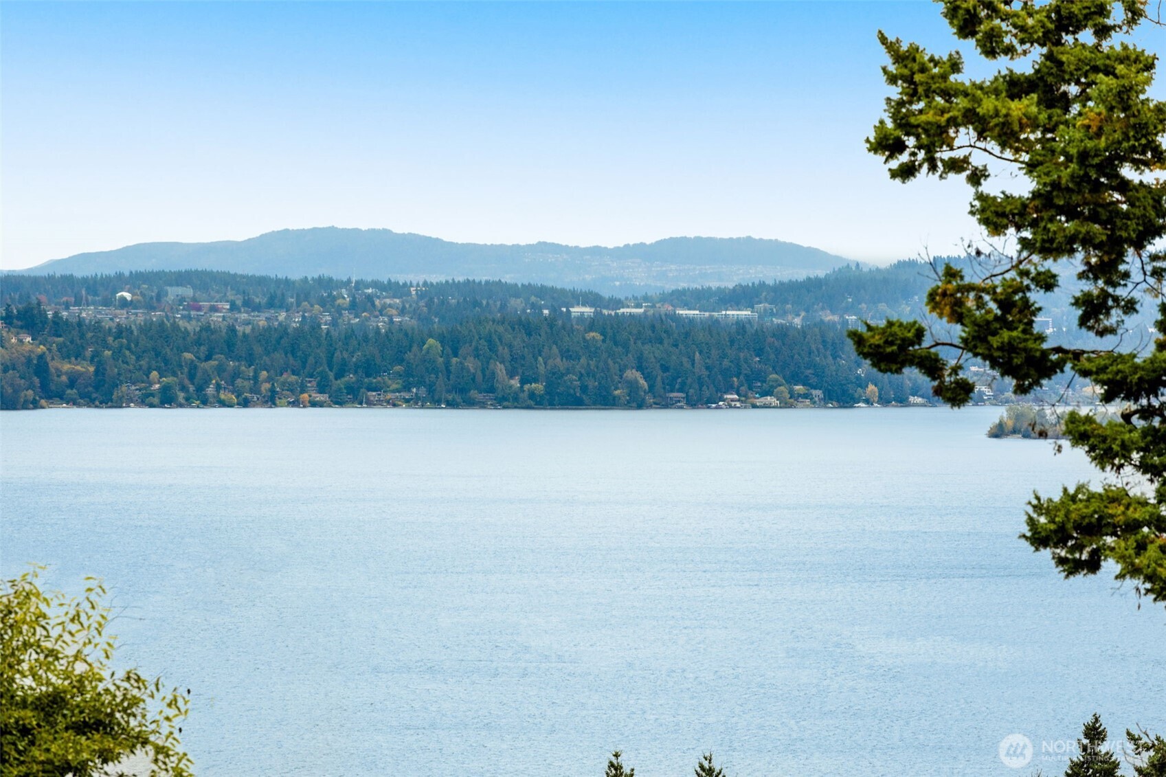 3406 East Spring Street Seattle, WA 98122 - Photo 6 of 10 a view of lake with mountain