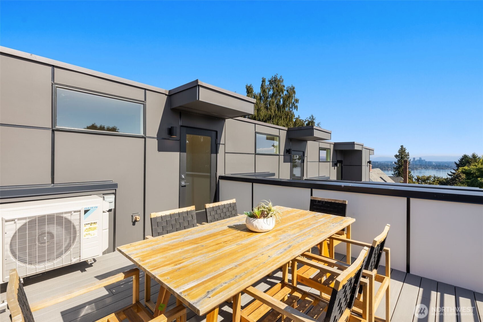 3406 East Spring Street Seattle, WA 98122 - Photo 9 of 10 a balcony with table and chairs