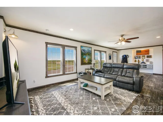 a kitchen with kitchen island a sink stove and refrigerator