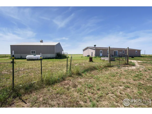 a view of a floor to an empty room