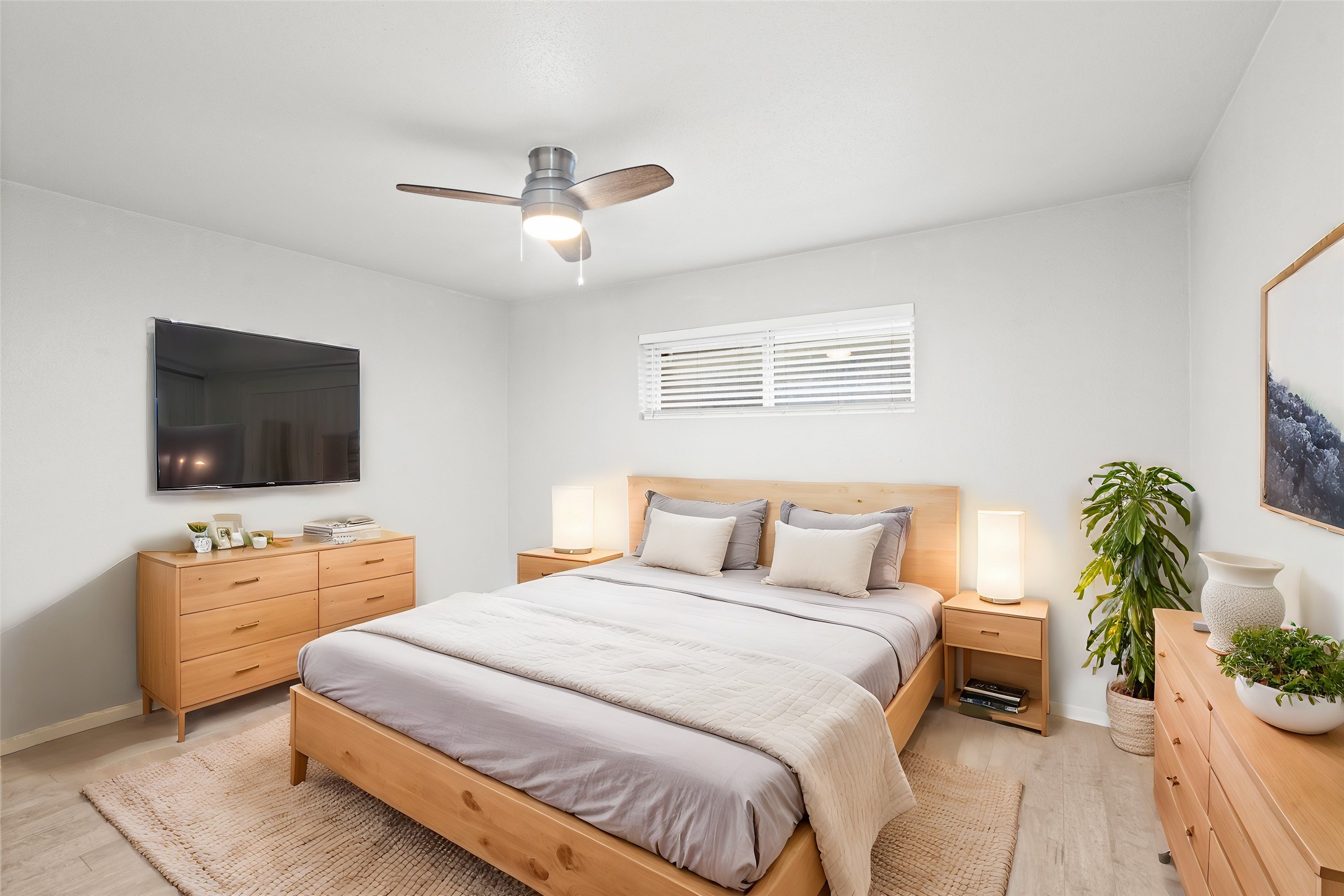 3924 West Alabama Street, Unit 4 Houston, TX 77027 - Photo 7 of 21 Enjoy a comfortable primary bedroom that offers plenty of space for a suite of furniture.