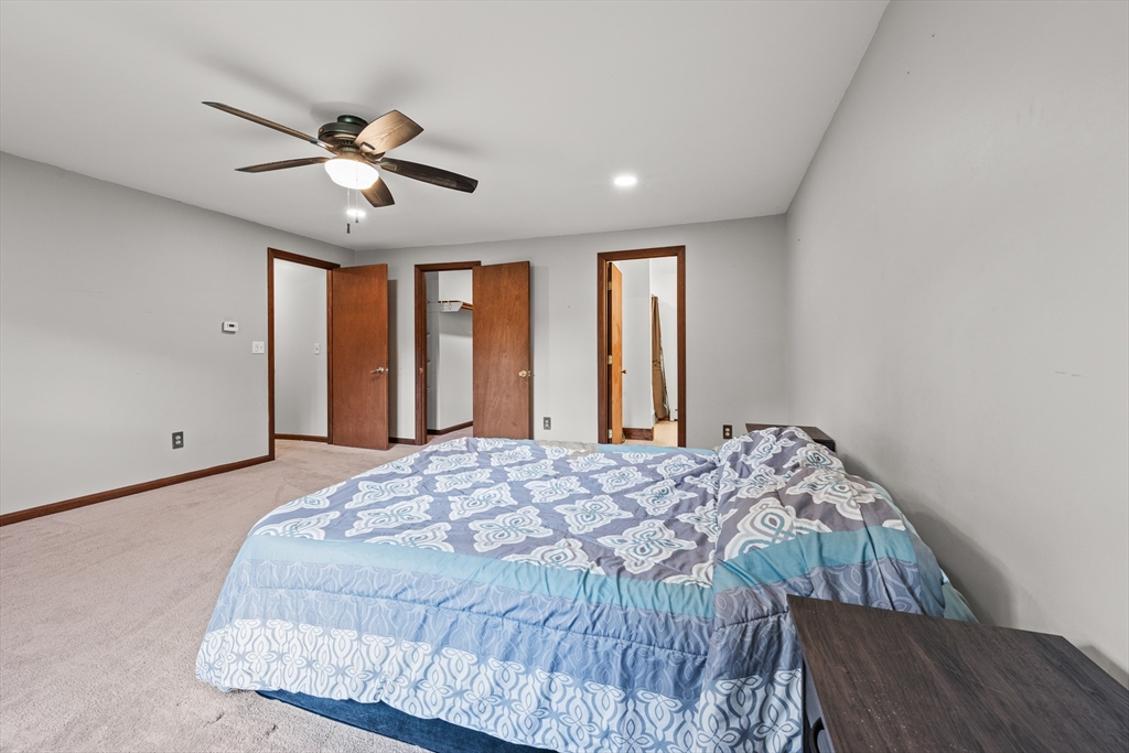 376 Chapin Road Hampden, MA 01036 - Photo 16 of 38 a bedroom with a large bed and a window
