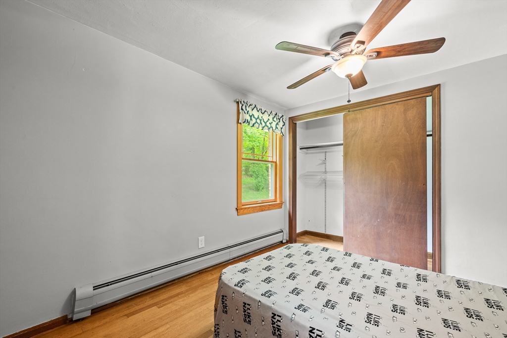 376 Chapin Road Hampden, MA 01036 - Photo 20 of 38 a bedroom with a bed and a window