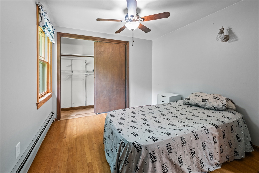 376 Chapin Road Hampden, MA 01036 - Photo 21 of 38 a bedroom with a bed and a window