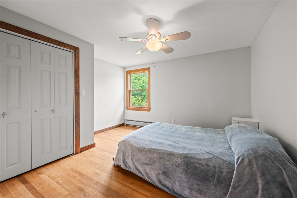 376 Chapin Road Hampden, MA 01036 - Photo 22 of 38 a bedroom with a bed and a window