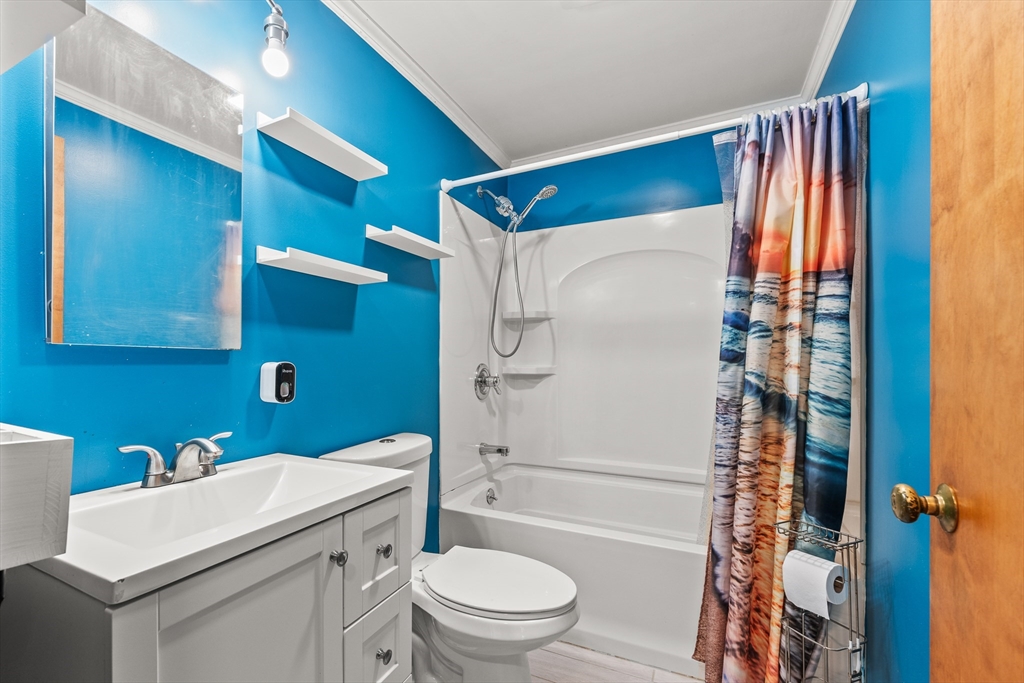 376 Chapin Road Hampden, MA 01036 - Photo 26 of 38 a bathroom with a sink a toilet and shower