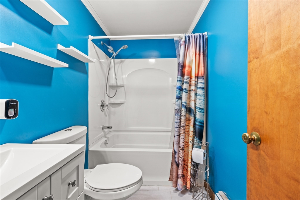 376 Chapin Road Hampden, MA 01036 - Photo 27 of 38 a bathroom with a toilet and a shower