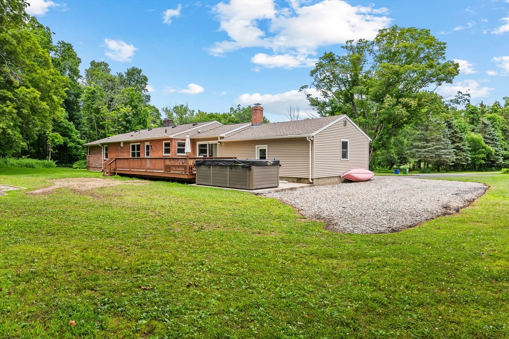 376 Chapin Road Hampden, MA 01036 - Photo 31 of 38 a view of a house with a big yard and large trees