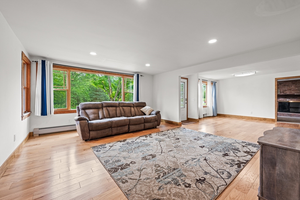 376 Chapin Road Hampden, MA 01036 - Photo 7 of 38 a living room with furniture and a large window
