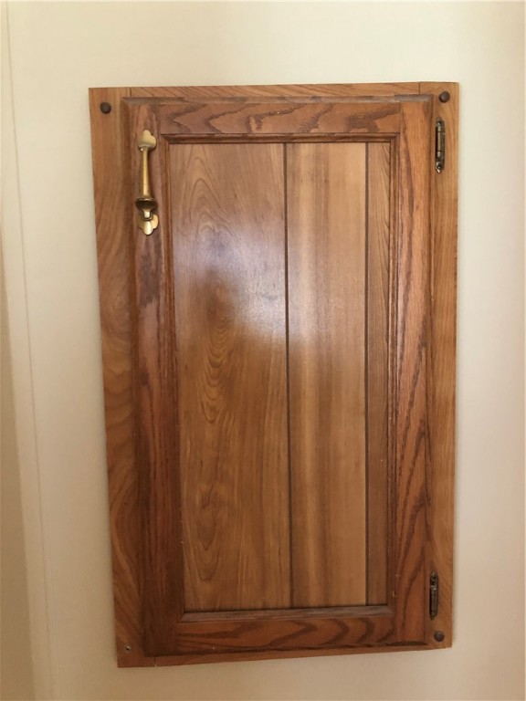 248 Webb Road Seneca, SC 29678 - Photo 20 of 37 Electric Panel Behind Master Bedroom Door