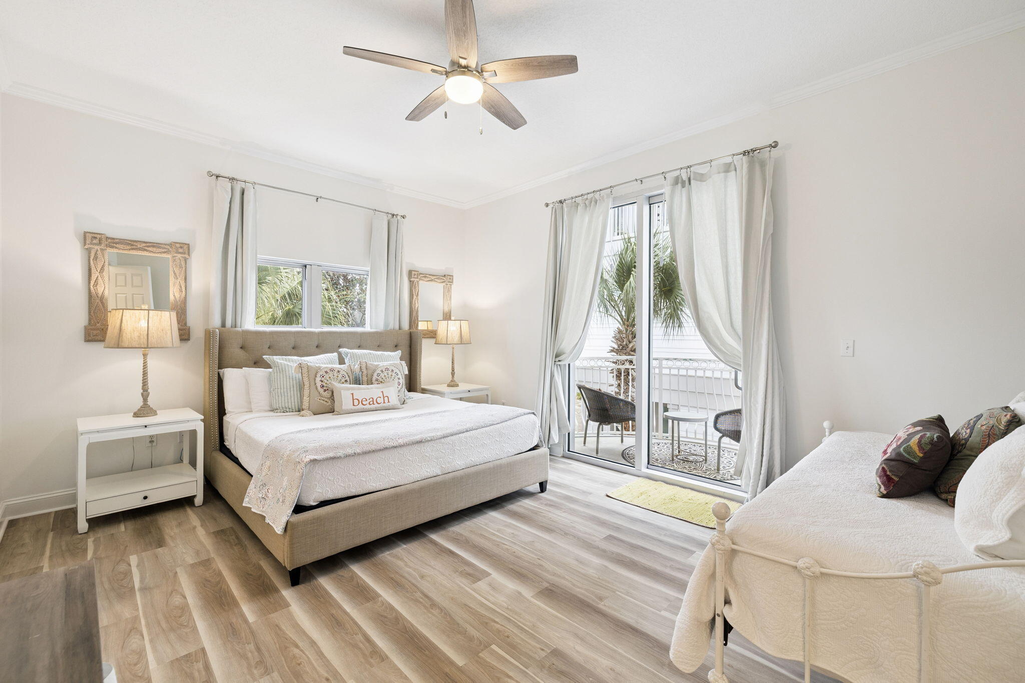 9961 East County Highway 30A, Unit 201 Inlet Beach, FL 32461 - Photo 13 of 35 a bedroom with a bed and a large window