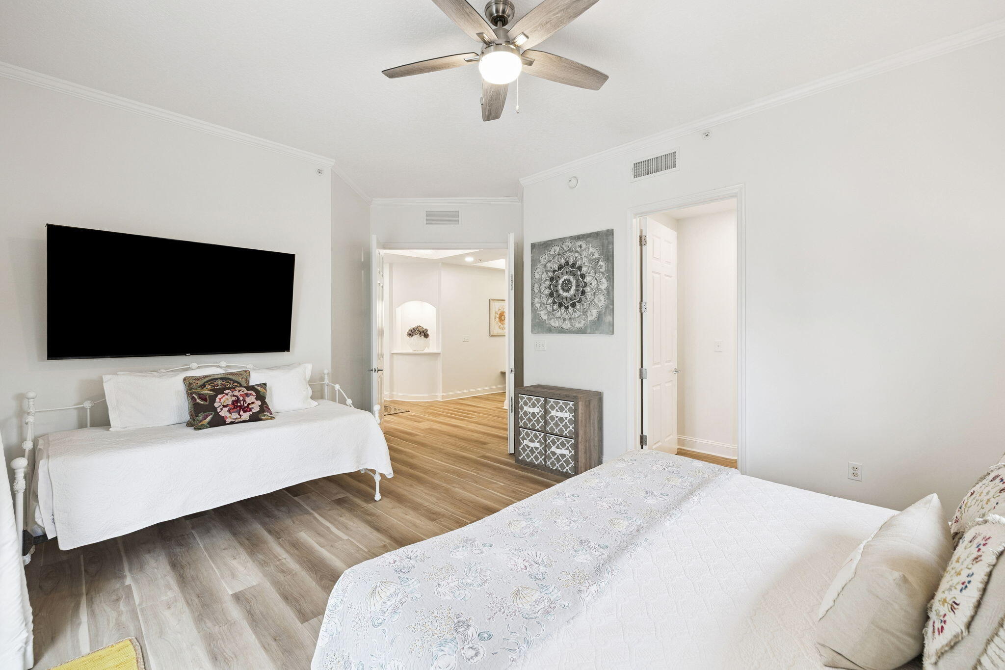 9961 East County Highway 30A, Unit 201 Inlet Beach, FL 32461 - Photo 14 of 35 a bedroom with a bed and a flat screen tv