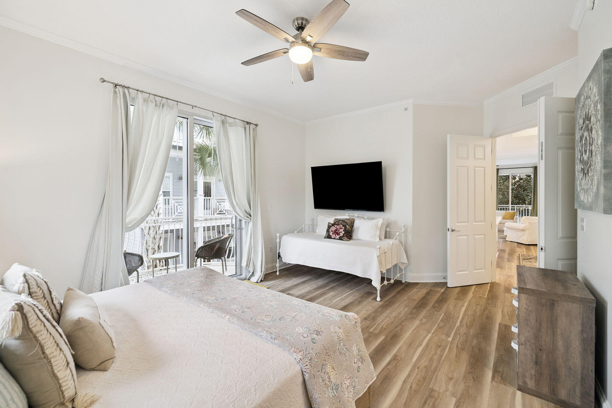 9961 East County Highway 30A, Unit 201 Inlet Beach, FL 32461 - Photo 15 of 35 a bedroom with a bed and a flat screen tv