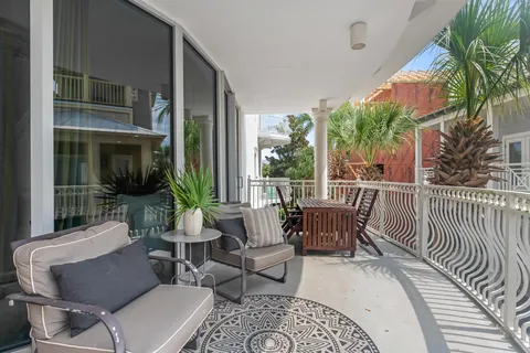a view of balcony with furniture
