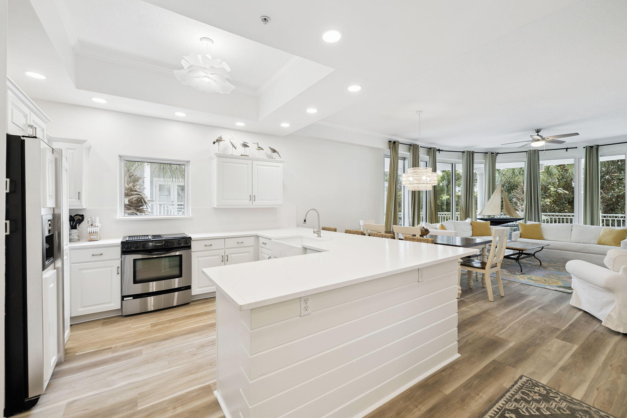9961 East County Highway 30A, Unit 201 Inlet Beach, FL 32461 - Photo 3 of 35 a large white kitchen with a large window