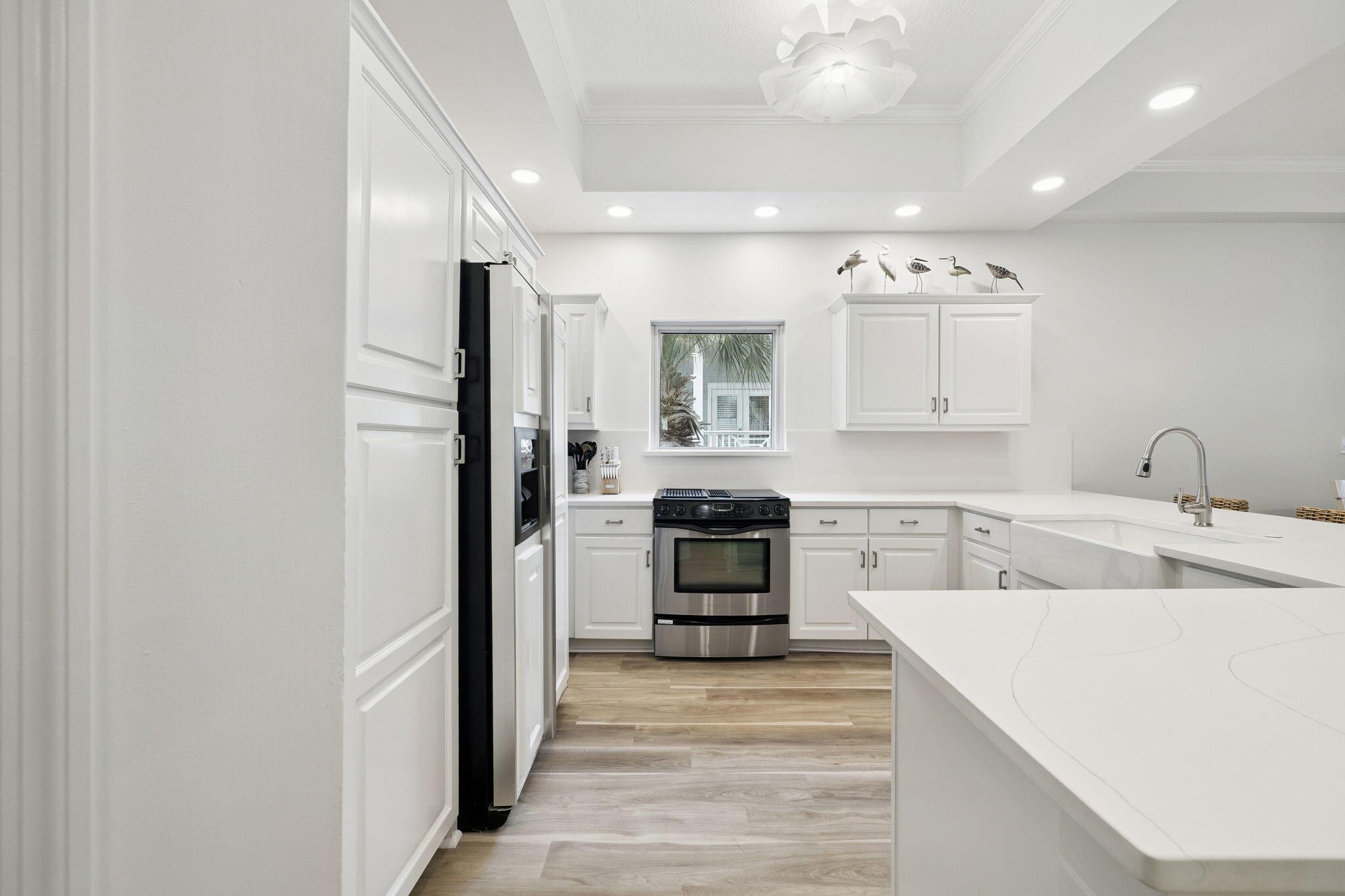 9961 East County Highway 30A, Unit 201 Inlet Beach, FL 32461 - Photo 6 of 35 a kitchen with a refrigerator and a sink
