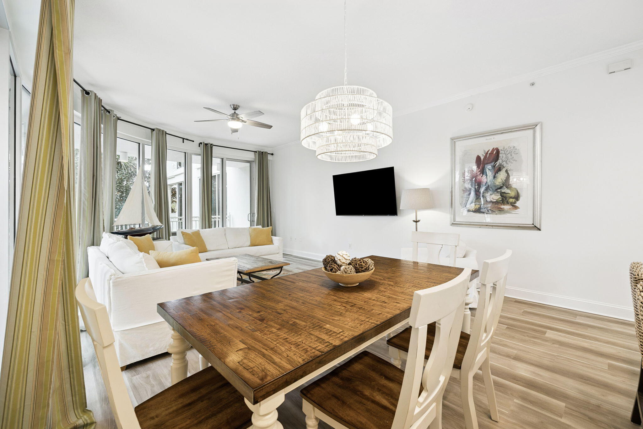 9961 East County Highway 30A, Unit 201 Inlet Beach, FL 32461 - Photo 9 of 35 a view of a dining room with furniture window and wooden floor