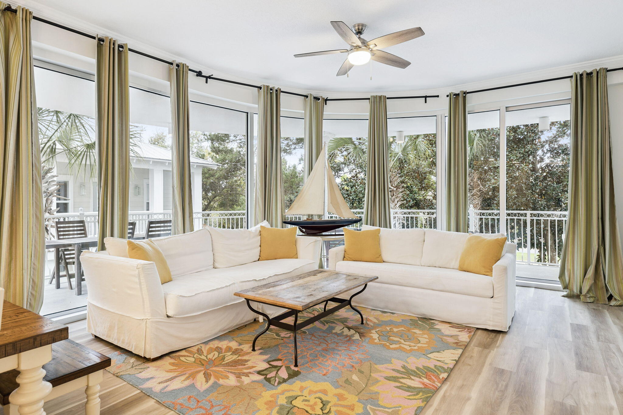 9961 East County Highway 30A, Unit 201 Inlet Beach, FL 32461 - Photo 10 of 35 a living room with furniture large windows and wooden floor