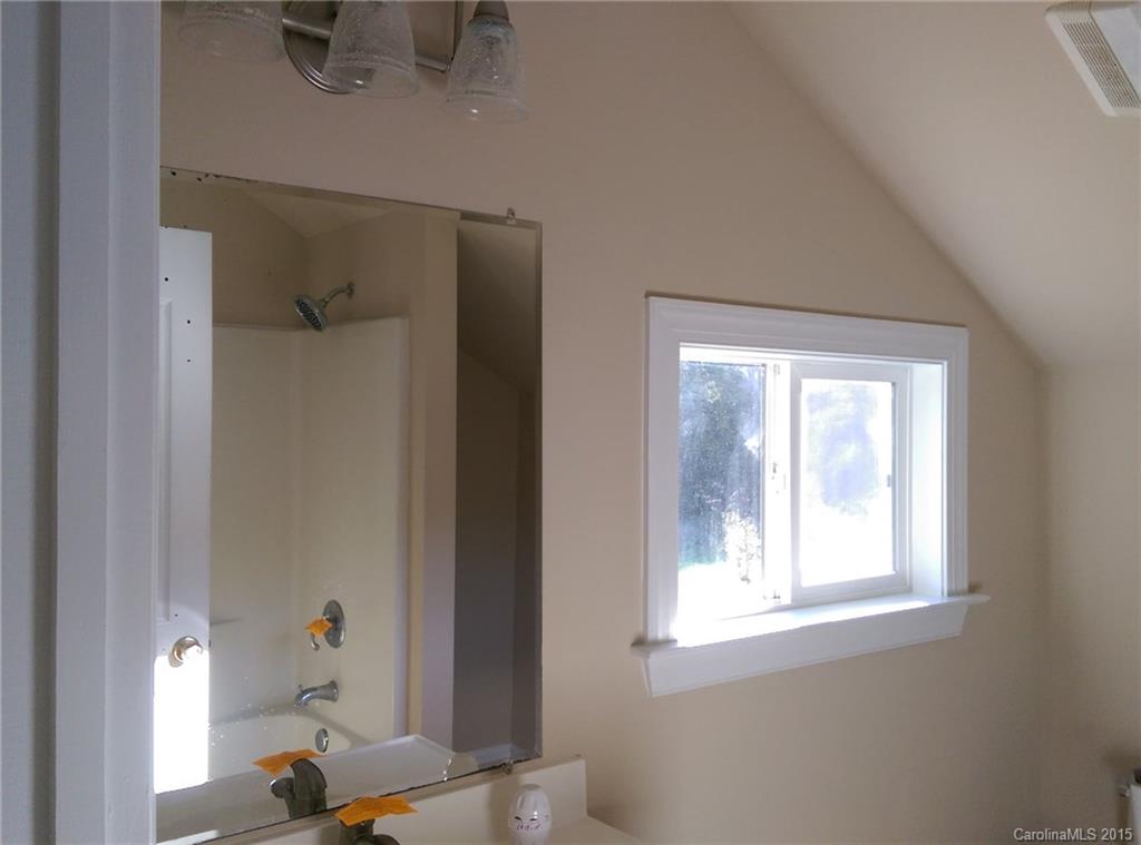 162 Sardis Road Mooresville, NC 28115 - Photo 12 of 15 a bathroom with a window and a shower