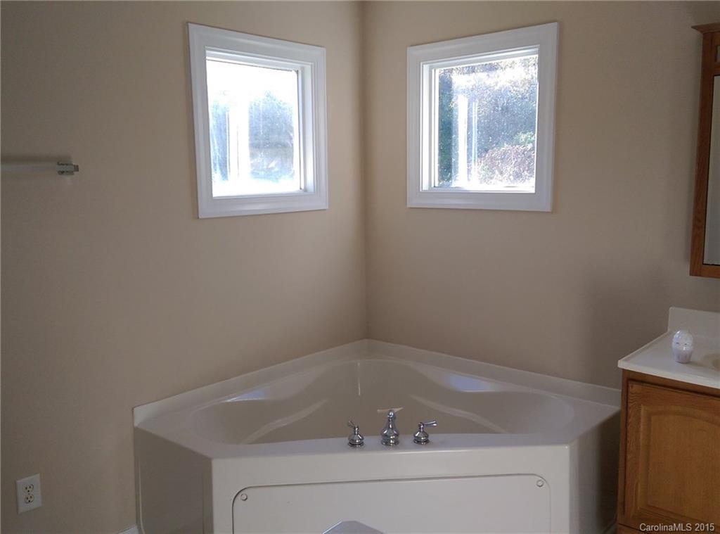 162 Sardis Road Mooresville, NC 28115 - Photo 6 of 15 a bathroom with a tub