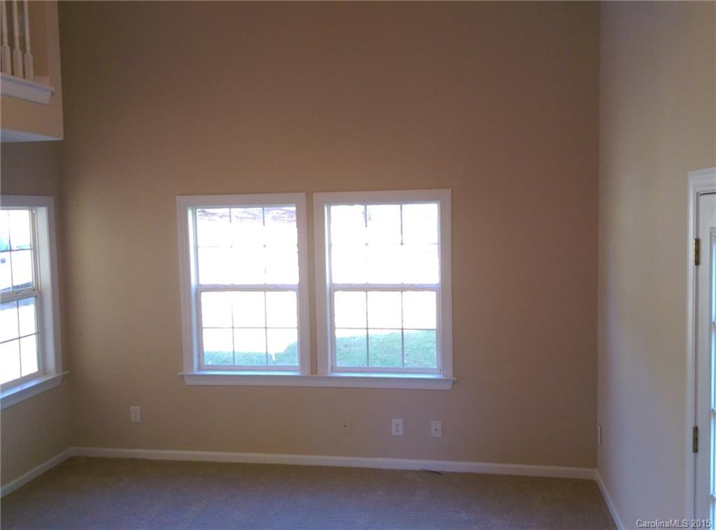 162 Sardis Road Mooresville, NC 28115 - Photo 8 of 15 an empty room with a window
