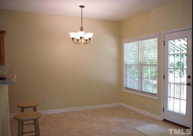 125 Oak Road Butner, NC 27509 - Photo 3 of 8 Breakfast area off kitchen with access to back deck.