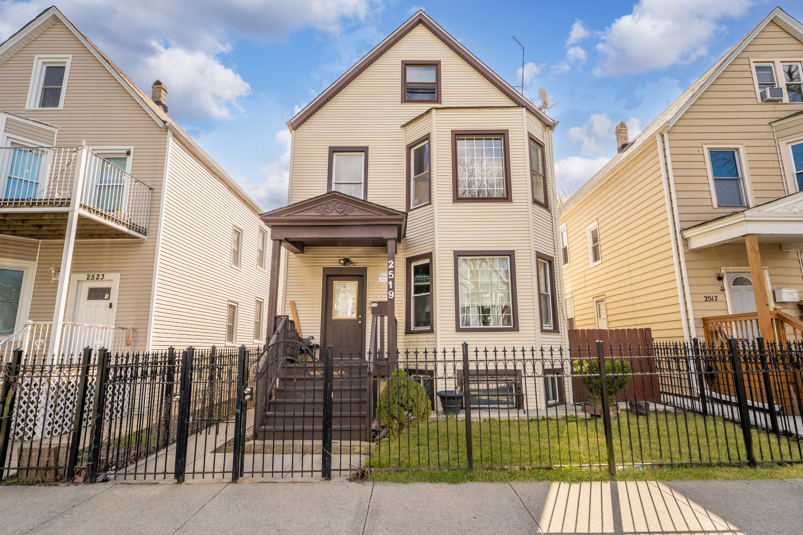 Undisclosed Address Chicago, IL 60647 - Photo 1 of 13 a view of a brick house with large windows and a potted plant