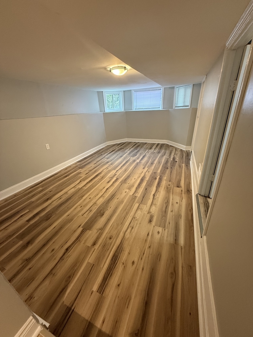 Undisclosed Address Chicago, IL 60647 - Photo 2 of 13 a view of wooden floor