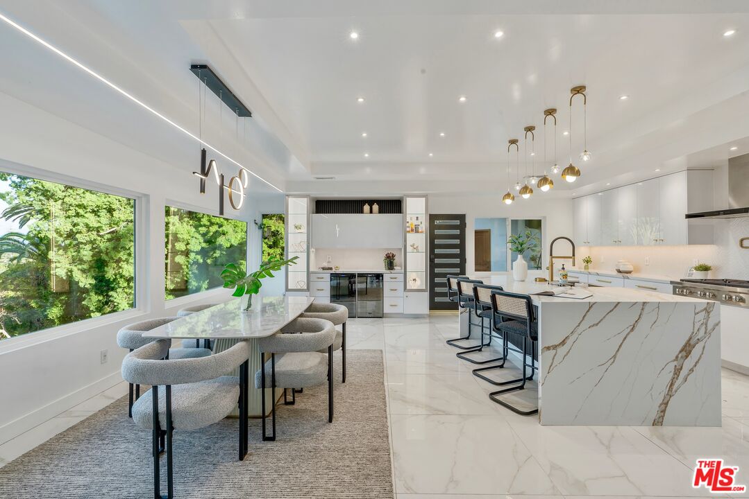 4854 Brewster Drive Tarzana, CA 91356 - Photo 19 of 60 a view of a dining room with furniture window and outside view