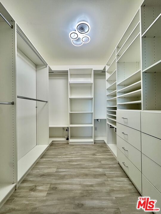 4854 Brewster Drive Tarzana, CA 91356 - Photo 60 of 60 a view of a room with storage and utility room