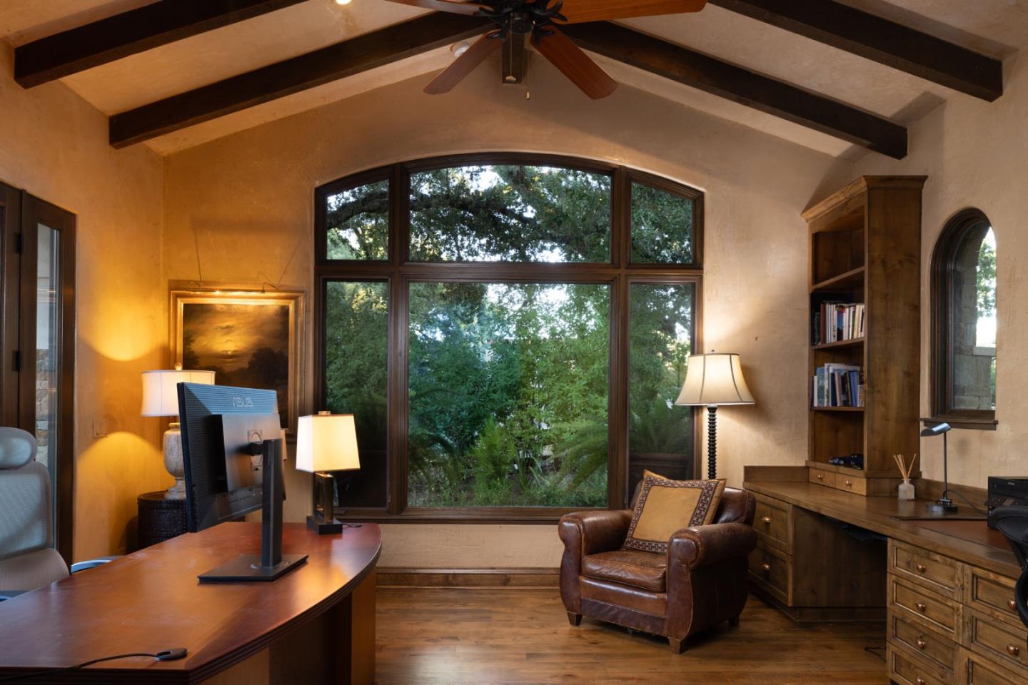 4 Rumsen Trace Carmel, CA 93923 - Photo 13 of 21 a living room with furniture and a lamp