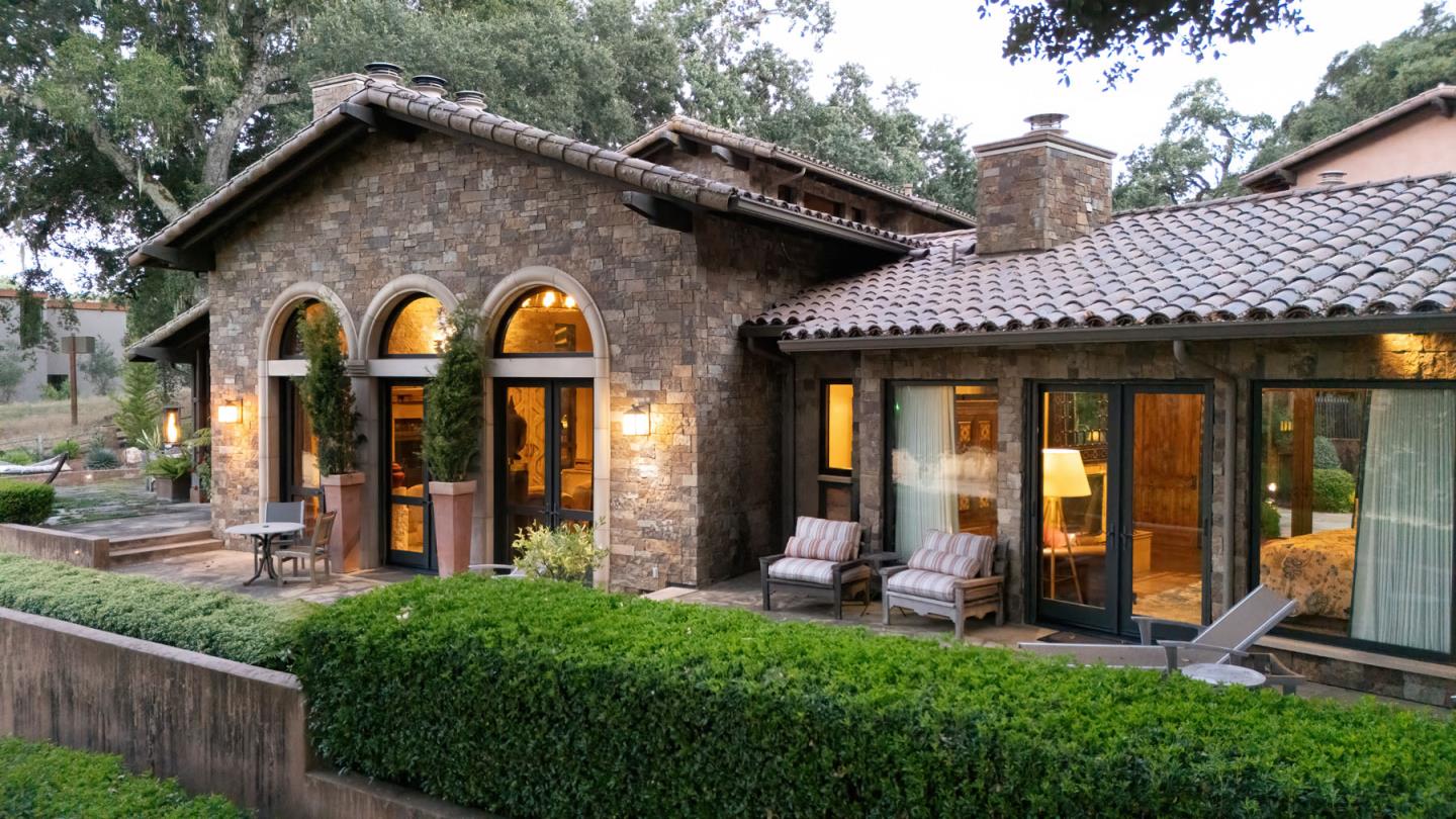 4 Rumsen Trace Carmel, CA 93923 - Photo 17 of 21 a front view of a house with garden