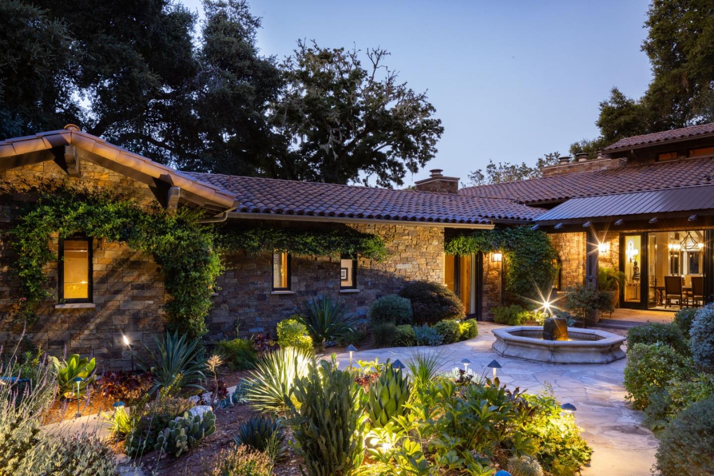 4 Rumsen Trace Carmel, CA 93923 - Photo 3 of 21 a view of a swimming pool with a patio