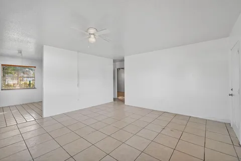 a view of an empty room and window