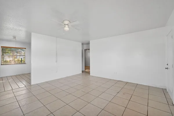 a view of an empty room and window