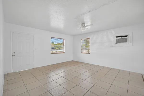 a view of an empty room and window