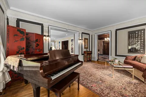 a very nice looking living room with a large window