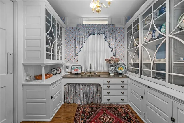 a bathroom with a sink a toilet and bathtub