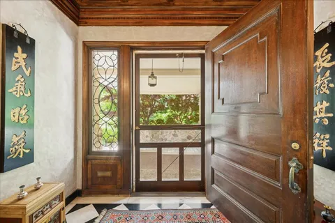 a living room with furniture and a outdoor space